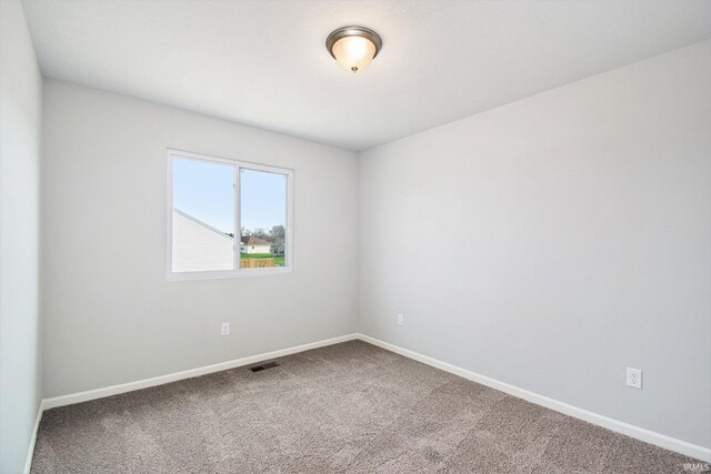 2170 Miami Trl, Huntington, IN 46750 - spare room with carpet floors and baseboards