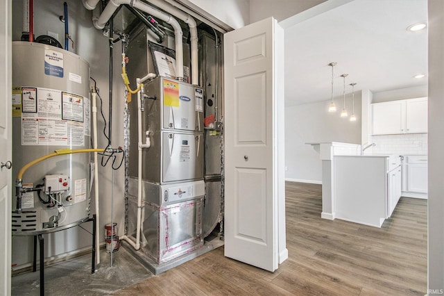 2170 Miami Trl, Huntington, IN 46750 - utility room with water heater and heating unit