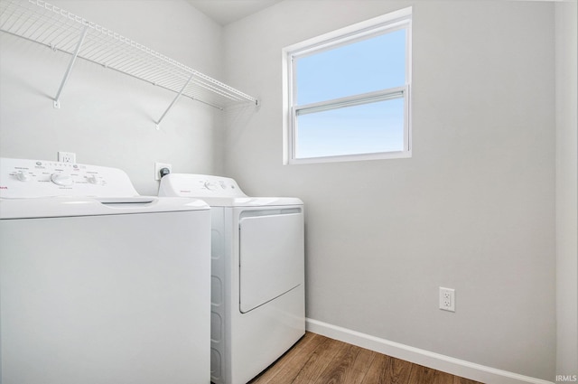 2170 Miami Trl, Huntington, IN 46750 - washroom with washing machine and clothes dryer, wood finished floors, and baseboards