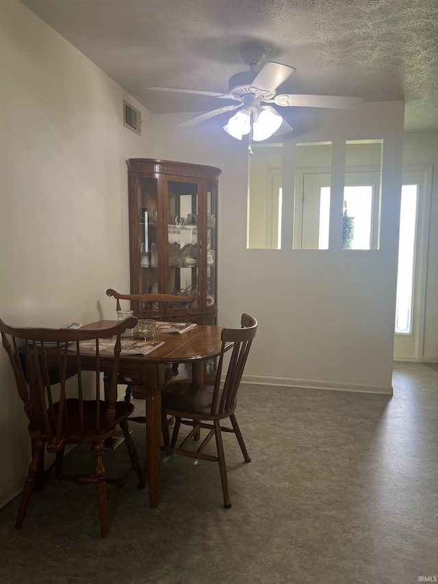 509 E Vincennes St, Orleans, IN 47452 - dining space featuring a ceiling fan and a textured ceiling