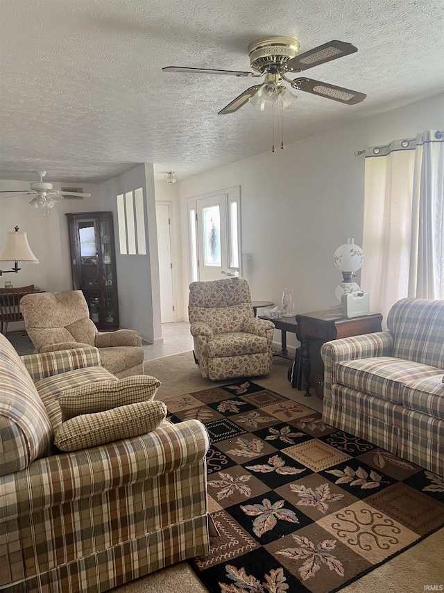 509 E Vincennes St, Orleans, IN 47452 - living room featuring a ceiling fan and a textured ceiling