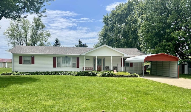 509 E Vincennes St, Orleans, IN 47452 - ranch-style home with covered porch, a front yard, driveway, a carport, and roof with shingles