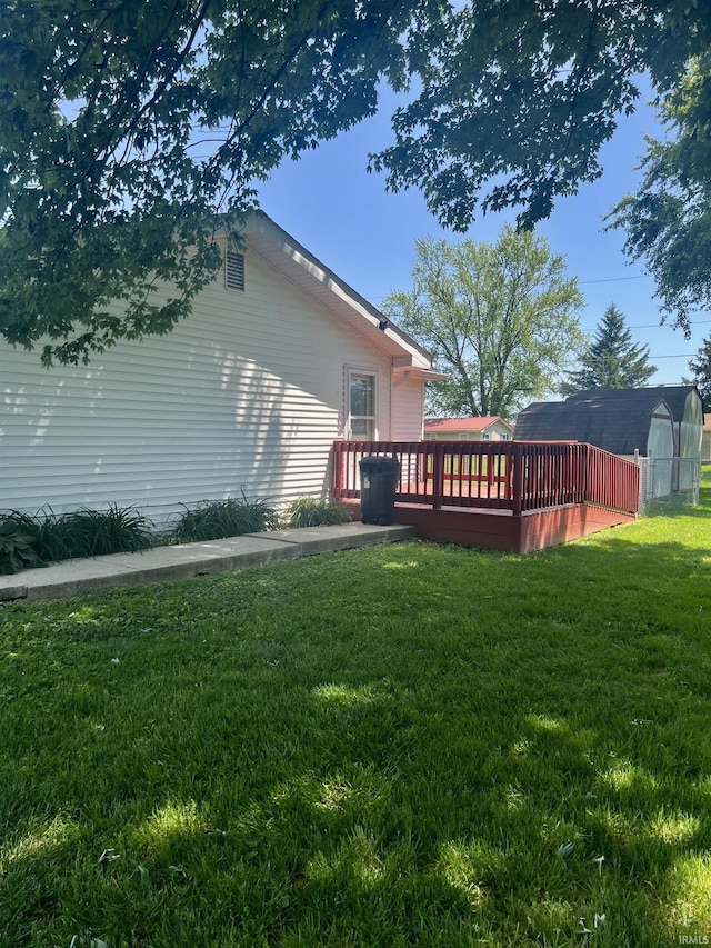 509 E Vincennes St, Orleans, IN 47452 - view of grassy yard with a wooden deck