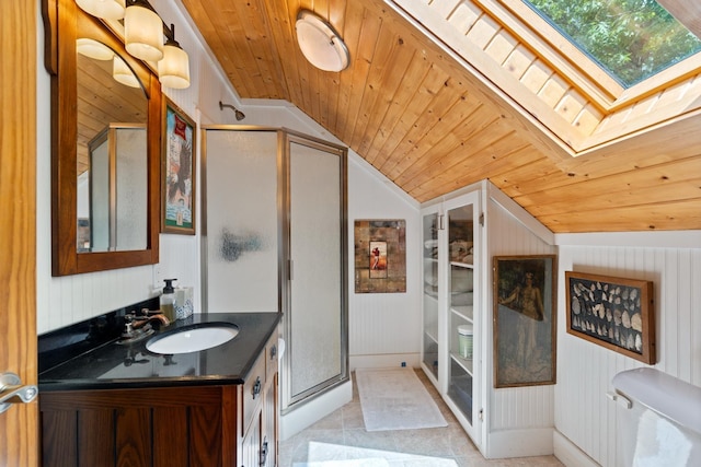 135 Ems D13 Ln, Syracuse, IN 46567 - bathroom with lofted ceiling, wooden ceiling, a stall shower, vanity, and a skylight