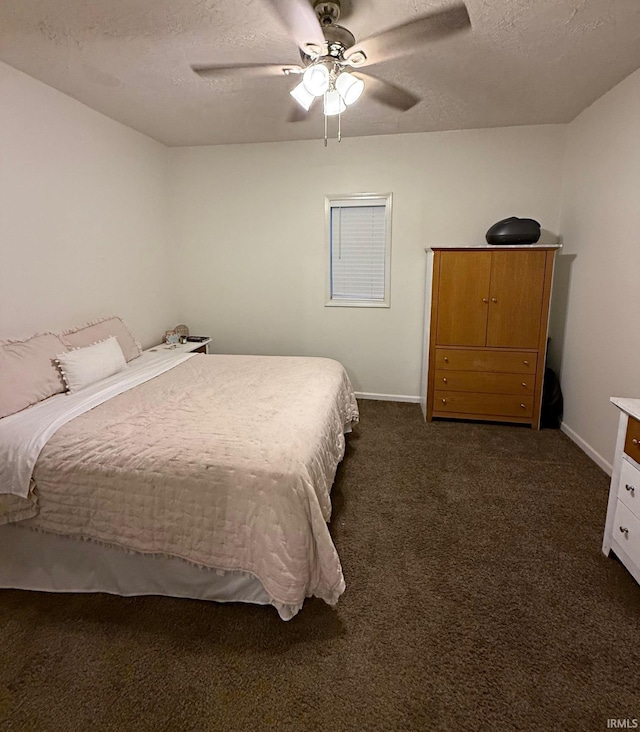 2146 N 20th St, Terre Haute, IN 47804 - bedroom with dark colored carpet, a textured ceiling, baseboards, and a ceiling fan