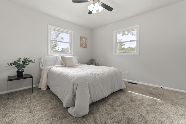 8020 Marston Dr, Fort Wayne, IN 46835 - carpeted bedroom with baseboards and a ceiling fan
