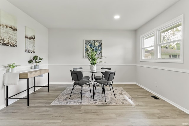 8020 Marston Dr, Fort Wayne, IN 46835 - dining room featuring wood finished floors, baseboards, and recessed lighting