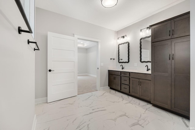 13335 Passerine Blvd, Fort Wayne, IN 46845 - bathroom featuring marble look tile flooring, baseboards, and double vanity