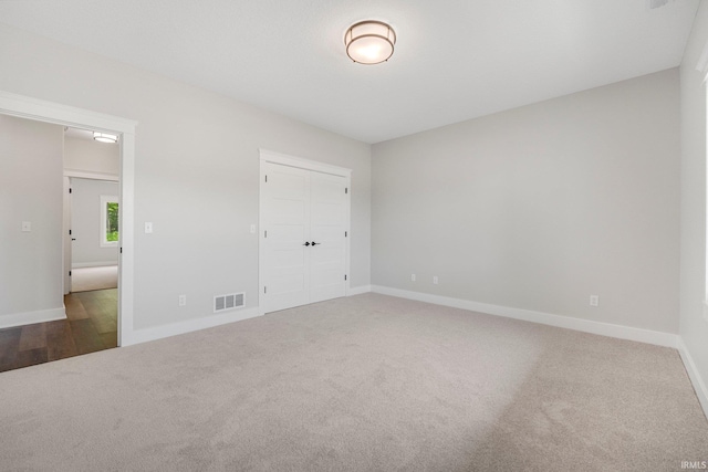 13335 Passerine Blvd, Fort Wayne, IN 46845 - unfurnished bedroom with carpet floors, baseboards, and a closet