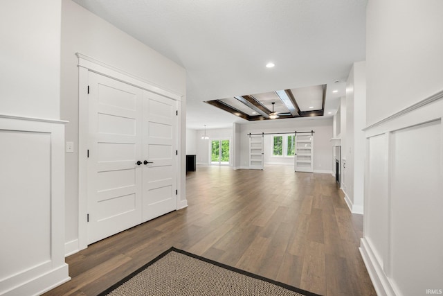 13335 Passerine Blvd, Fort Wayne, IN 46845 - foyer featuring a barn door, dark wood-type flooring, recessed lighting, and baseboards