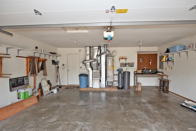 4335 Hadley Ct, West Lafayette, IN 47906 - garage featuring water heater, a garage door opener, and baseboards