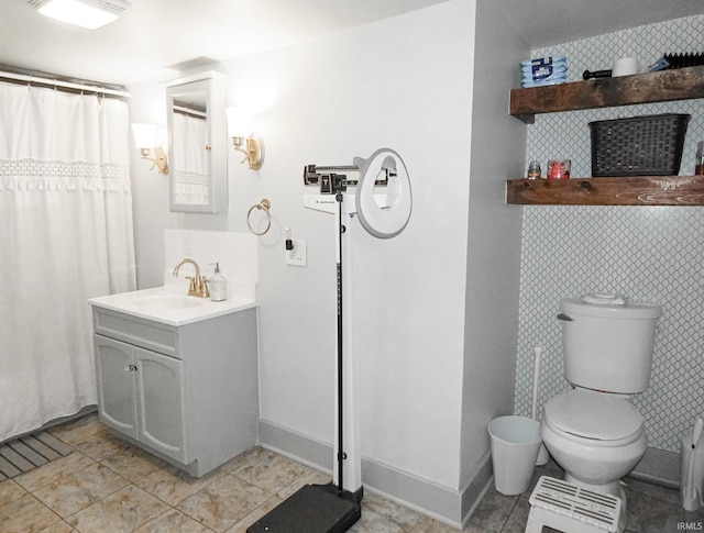 302 E Main St, Swayzee, IN 46986 - bathroom with toilet, vanity, and tile patterned flooring