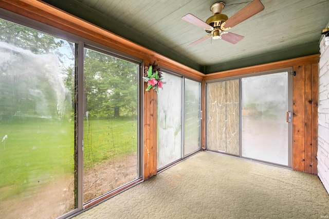 4837 Covered Bridge Rd, Nashville, IN 47448 - unfurnished sunroom featuring plenty of natural light and carpet flooring