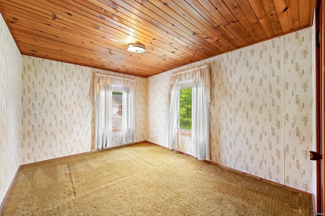 4837 Covered Bridge Rd, Nashville, IN 47448 - empty room with wallpapered walls, carpet floors, and wood ceiling