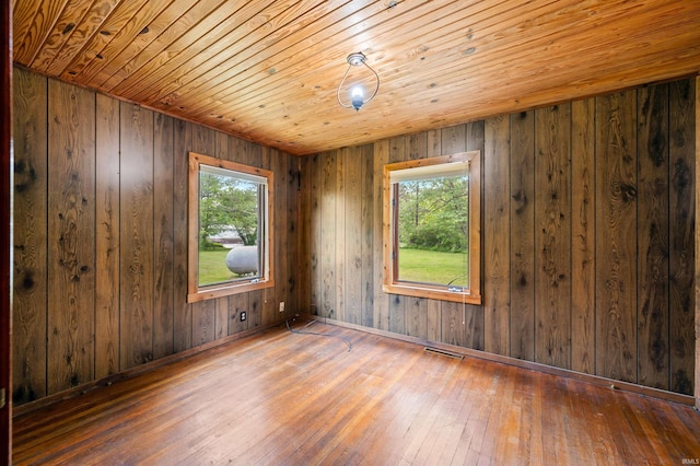 4837 Covered Bridge Rd, Nashville, IN 47448 - unfurnished room with wood-type flooring, wood ceiling, and wooden walls
