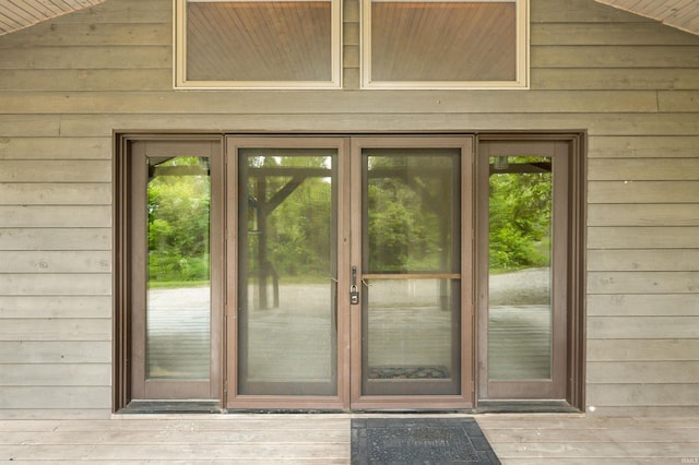 4837 Covered Bridge Rd, Nashville, IN 47448 - doorway to outside featuring wood walls and lofted ceiling