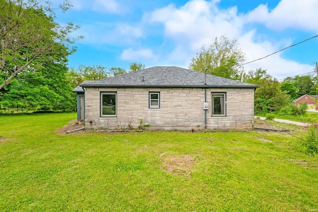 4837 Covered Bridge Rd, Nashville, IN 47448 - rear view of property with stone siding, a yard, and a shingled roof
