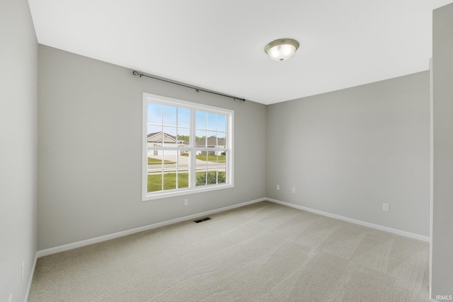 7696 Lila Way, Fort Wayne, IN 46835 - unfurnished room with light carpet and baseboards