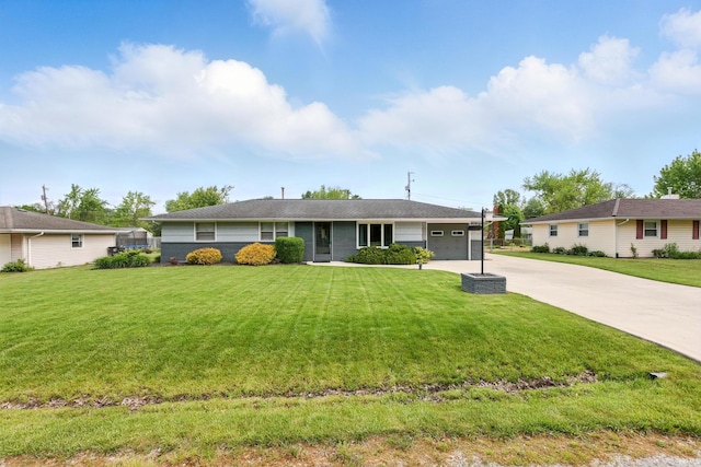 7205 Eby Rd, Fort Wayne, IN 46835 - ranch-style home featuring an attached garage, concrete driveway, and a front lawn