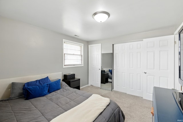 7205 Eby Rd, Fort Wayne, IN 46835 - bedroom with light colored carpet, a closet, and baseboards