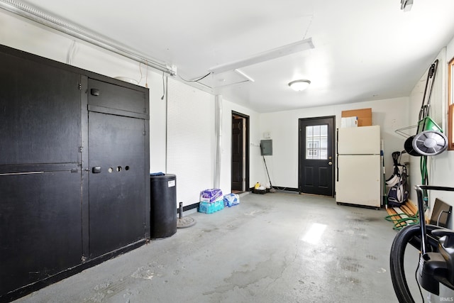7205 Eby Rd, Fort Wayne, IN 46835 - garage featuring freestanding refrigerator