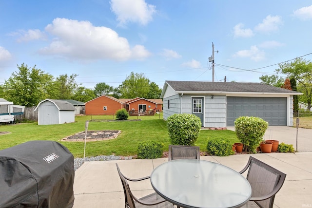 7205 Eby Rd, Fort Wayne, IN 46835 - view of patio featuring a garage and outdoor dining space