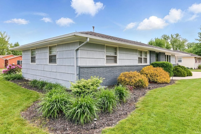 7205 Eby Rd, Fort Wayne, IN 46835 - view of property exterior featuring a lawn