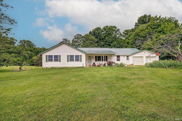 7373 Locust Lake Rd, Spencer, IN 47460 - ranch-style house with a front lawn, a porch, an attached garage, and metal roof