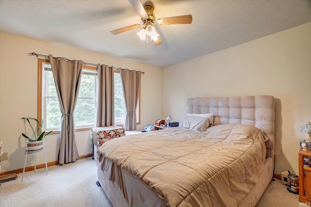 7373 Locust Lake Rd, Spencer, IN 47460 - bedroom with light carpet, baseboards, and a ceiling fan