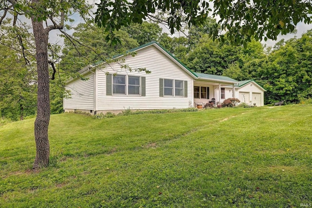 7373 Locust Lake Rd, Spencer, IN 47460 - view of front facade with a front lawn, crawl space, and a detached garage