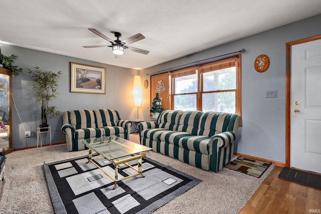 608 Fieldstone Ln, Middlebury, IN 46540 - living room featuring baseboards, ceiling fan, and wood finished floors