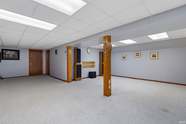 608 Fieldstone Ln, Middlebury, IN 46540 - finished basement with a paneled ceiling, carpet flooring, and baseboards