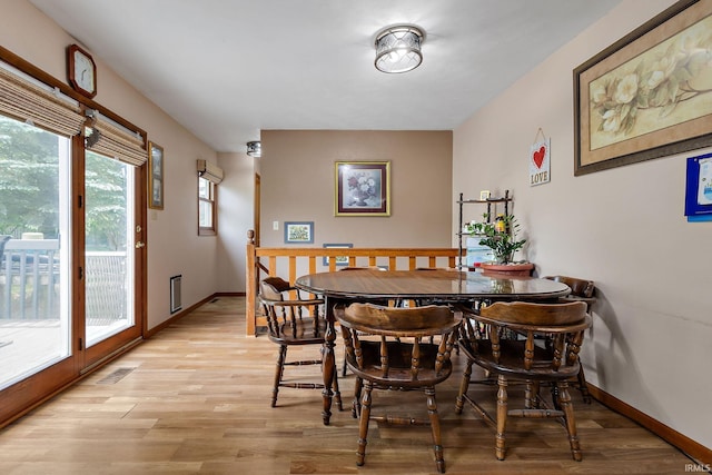 608 Fieldstone Ln, Middlebury, IN 46540 - dining area with light wood-style flooring and baseboards