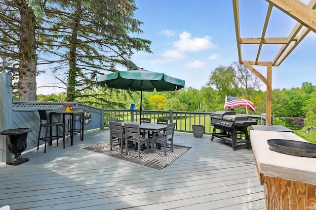 deck featuring outdoor dining space