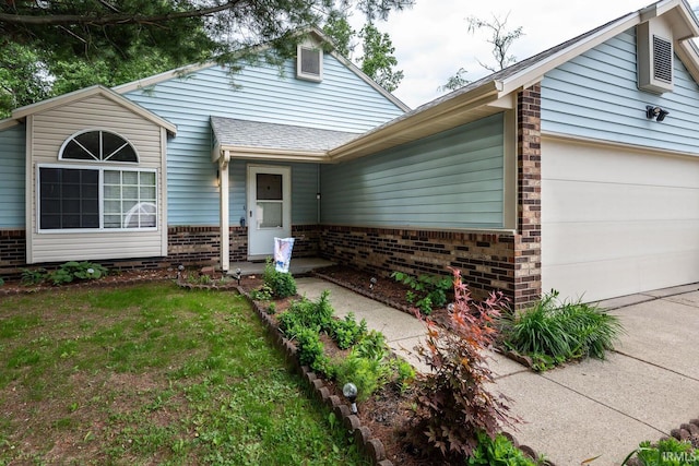 3879 Woodmere Way, Bloomington, IN 47403 - view of front of home featuring brick siding, a garage, concrete driveway, and roof with shingles