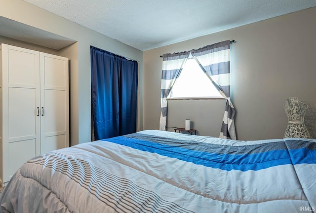 3879 Woodmere Way, Bloomington, IN 47403 - bedroom with a textured ceiling