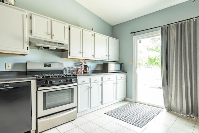 3879 Woodmere Way, Bloomington, IN 47403 - kitchen with under cabinet range hood, stainless steel appliances, white cabinetry, dark countertops, and light tile patterned flooring