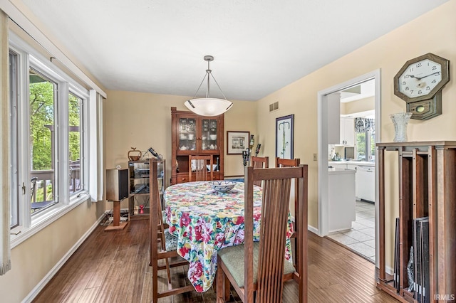 3455 Bridgetown Rd, Bristol, IN 46507 - dining area featuring wood finished floors and baseboards