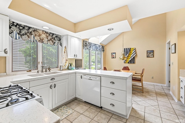 3455 Bridgetown Rd, Bristol, IN 46507 - kitchen featuring dishwasher, a sink, a peninsula, and light countertops