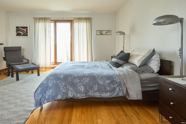 bedroom featuring wood finished floors