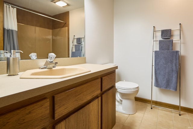 full bathroom with toilet, tile patterned flooring, vanity, a shower with shower curtain, and baseboards