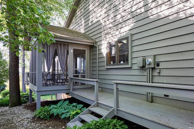 wooden terrace with a sunroom