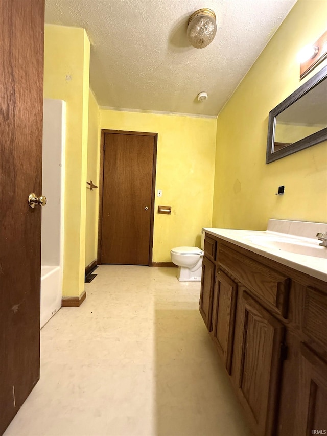 2855 N 525 W, Crawfordsville, IN 47933 - full bathroom with a textured ceiling, vanity, toilet, and baseboards