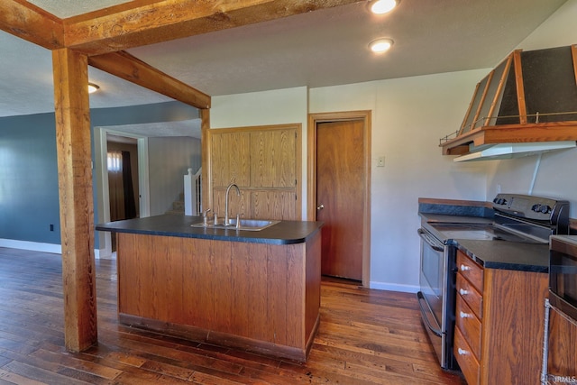 120 W Williams St, Chandler, IN 47610 - kitchen featuring stainless steel electric stove, a sink, dark countertops, and dark wood-style flooring