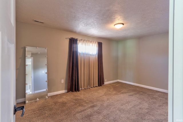 120 W Williams St, Chandler, IN 47610 - carpeted empty room with a textured ceiling and baseboards