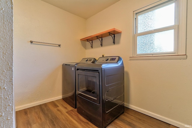 120 W Williams St, Chandler, IN 47610 - washroom with washing machine and dryer, wood finished floors, and baseboards