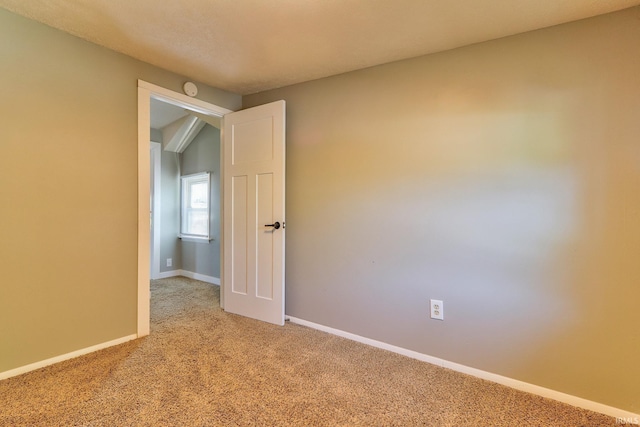 120 W Williams St, Chandler, IN 47610 - spare room featuring light colored carpet and baseboards