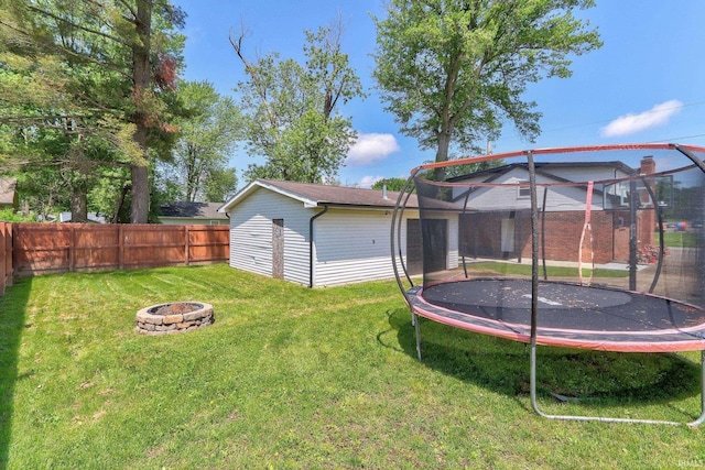 120 W Williams St, Chandler, IN 47610 - view of yard featuring a trampoline and a fire pit