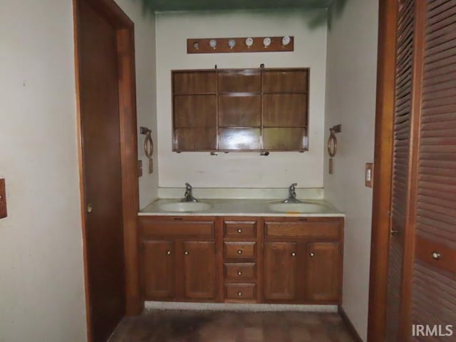bathroom featuring double vanity