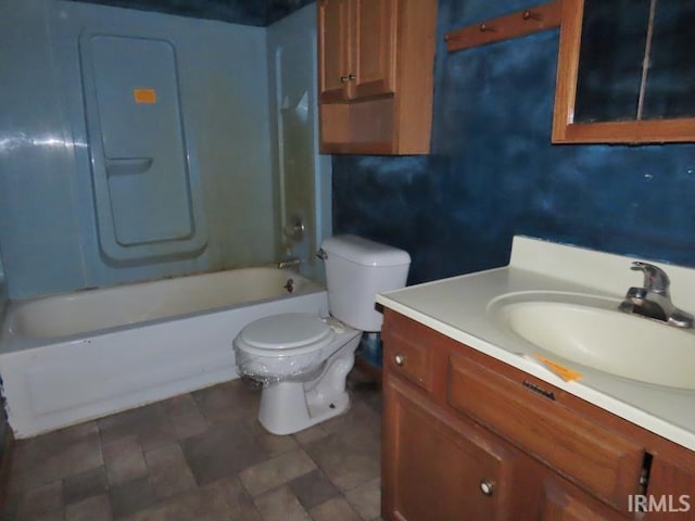 full bathroom with toilet, vanity, and bathing tub / shower combination
